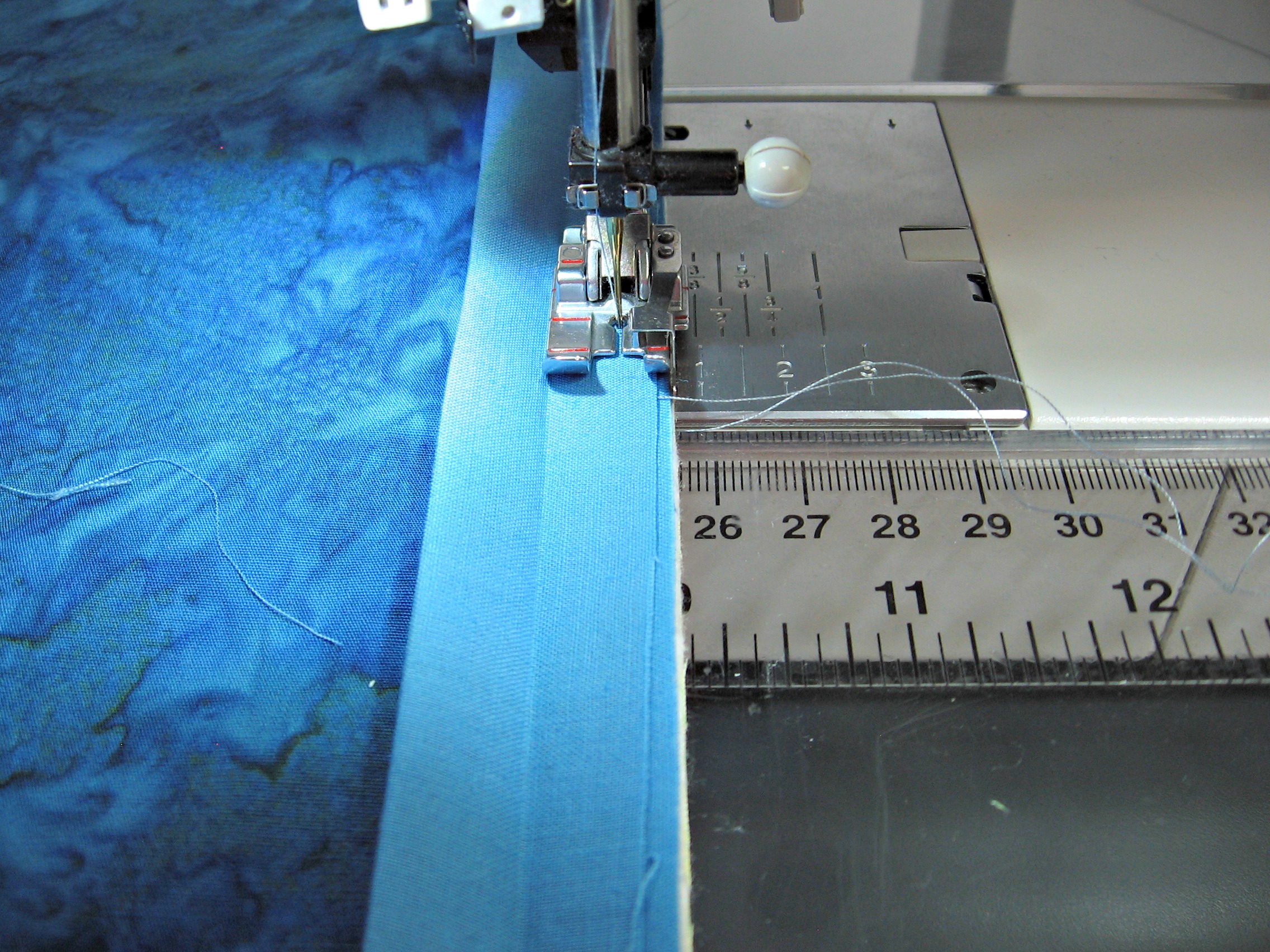 Start sewing above tails